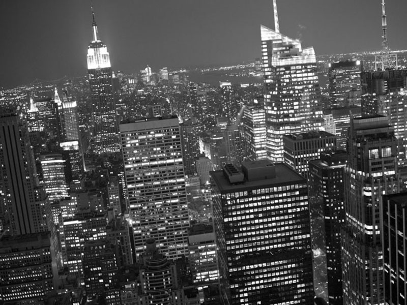 Night shot of a view of NYC from The Top of the Rock at a slight angle
